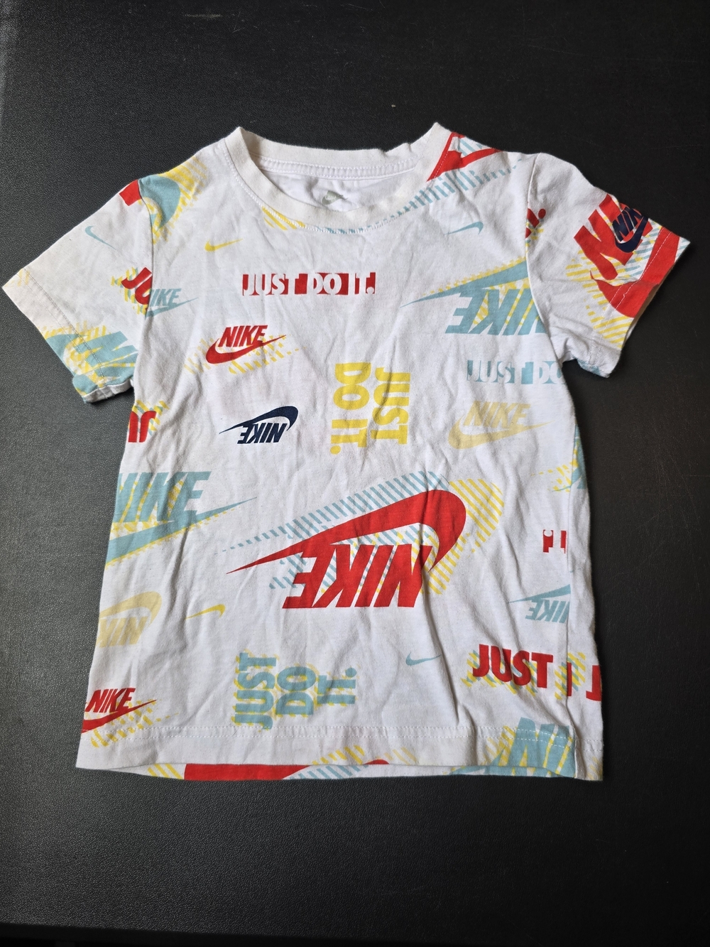 Nike White Short Sleeve Tee with Red, Yellow & Teal Logos